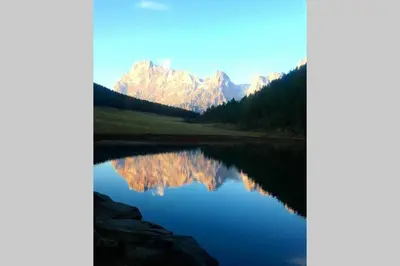 a view of a lake with mountains in the background at Casa da Rina in Siror