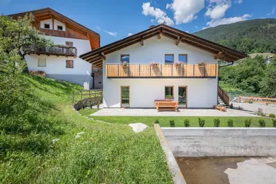 a villa with a view of the house at Der Söllhof in Bressanone