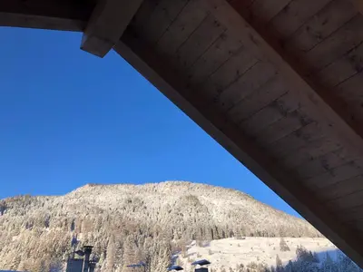 a view of a mountain from under a bridge at B&B Le Stagioni di Stava in Tesero