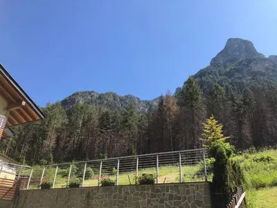 a stairway with a view of a mountain at B&B Le Stagioni di Stava in Tesero