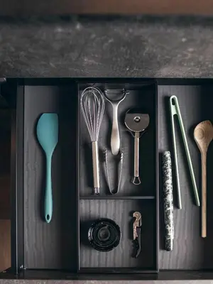 a black box with some kitchen utensils in it at Apartment 901 in Bressanone