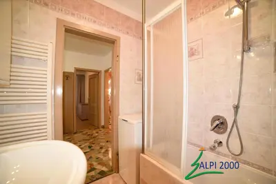 a bathroom with a shower and a toilet at Casa Dolomiti - BERTA in Campitello di Fassa