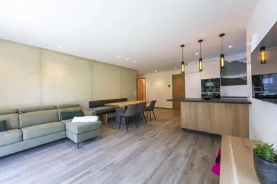 a living room with a couch and a table at Apartment Dauru in Ortisei
