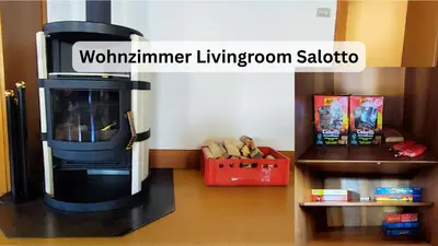 a living room with a woodburning stove in a room at Große Wohnung mit Garagenparkplatz in Vols am Schlern