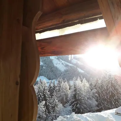 a view of a snow covered mountain from a window at Ringgelinhof Onach in San Lorenzo di Sebato