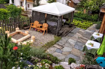an overhead view of a gazebo in a garden at La Ücia by Fana Ladina in San Vigilio Di Marebbe