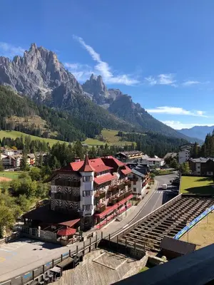 a view of a town with mountains in the background at Panoramic apartment 71 in San Martino di Castrozza