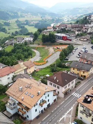 an aerial view of a town with a street at Casa Sartori in Tesero