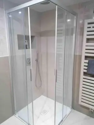 a shower with a glass enclosure in a bathroom at Apartment Al Sasso in Taibon