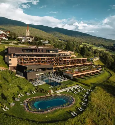 an aerial view of a resort with boats in front of it at Santre dolomythic home in Bressanone