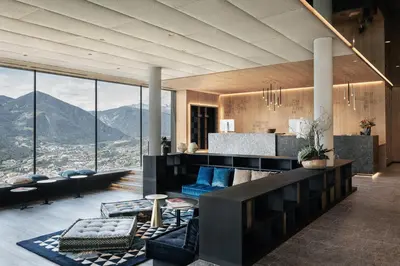 a living room with a view of the mountains at Santre dolomythic home in Bressanone