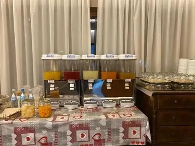a table with some drinks on top of it at Hotel Pizboè in Mazzin