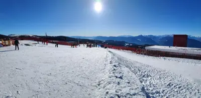 a group of people standing on a snow covered slope at Apartment Hagen in Merano