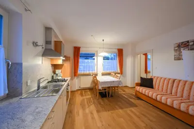 a bathroom with a shower and a sink and a toilet at Apartments Ferdigg in San Lorenzo di Sebato