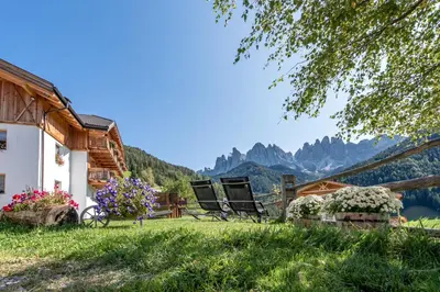 a house with a view of the mountains at Oberkantiolhof in Villnoss