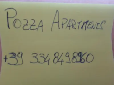 a piece of paper with handwriting on it at Pozza Appartamenti in Carano