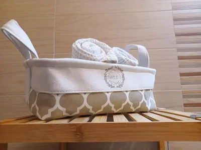 a diaper bag sitting on a wooden bench at Appartamento Valmaor in Predazzo