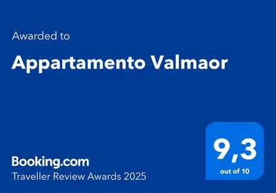 a blue sign with the words appointment examiner examiner at Appartamento Valmaor in Predazzo