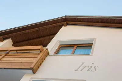 a window on the side of a building at Ciasa Iris in Colfosco