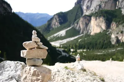 a stack of rocks sitting on top of a mountain at Ciasa Agreiter in La Villa