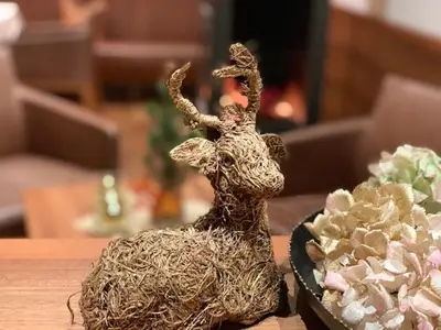 a small toy animal sitting on a table at Apparthotel Gartenresidence Nalserhof in Nalles