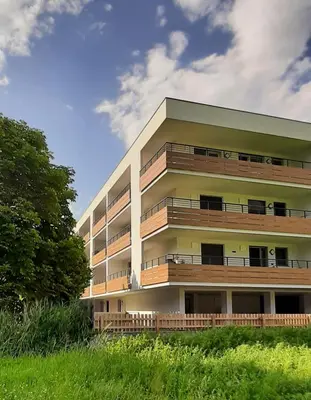 a building with balconies on the side of it at Residence Maximilian in Vipiteno