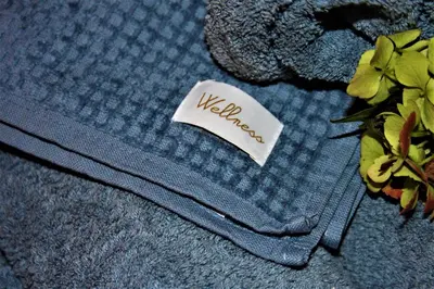 a piece of paper with the word warranty on a blue hat at Suite - Sweet MayLeen in Merano