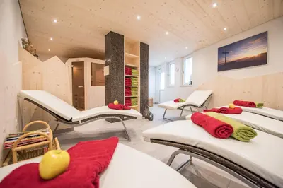 a hospital room with four beds and two exam tables at MOUNTAIN RESIDENCE ALPENHOF - company Hotel Alpenhof KG sas der Gasser Renate in Bressanone