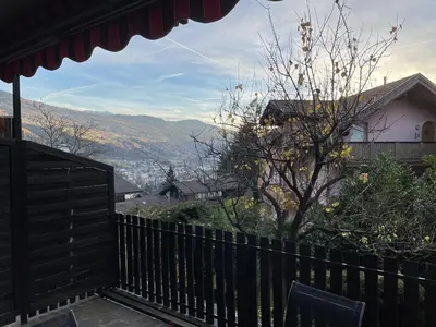 a balcony of a house with a fence at Apartment Lilli mit Garagenstellplatz in Bressanone