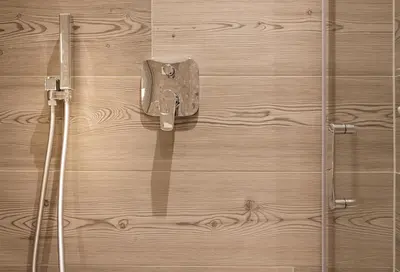 a wooden door with a metal latch on it at Apartments Pragser Wildsee - by Familiaris in Braies