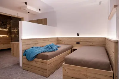 a bedroom with two beds in a room at Apartments Pragser Wildsee - by Familiaris in Braies