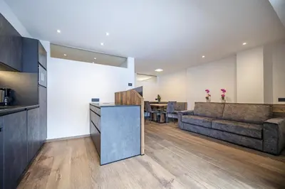 a living room with a couch and a table at Apartment Villa Hetty in Ortisei