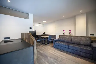 a living room with a couch and a table at Apartment Villa Hetty in Ortisei
