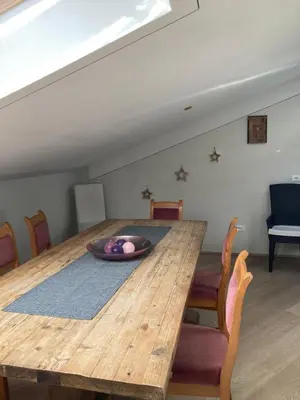 a dining room table with a bowl on top of it at Crystal House in Cavalese
