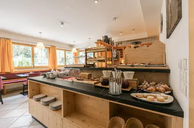 a kitchen with a counter with food on it at Gitschberg - Appartements in Vandoies
