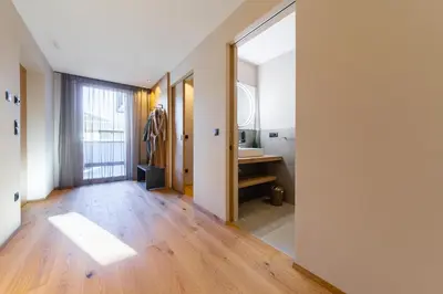 a bathroom with a sink and a mirror at Rienz Alpine City Lofts in Brunico
