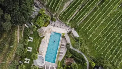 an overhead view of a swimming pool in a field at Huber unterm Baum in Lagundo