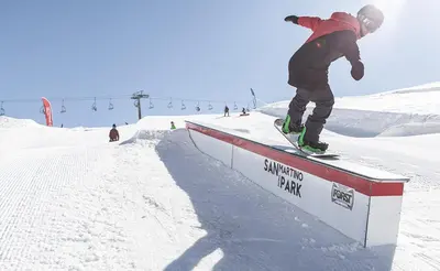 a person riding a snowboard on top of a rail at CASA BERNARD Zortea VANOI cuore verde del Trentino in Canale San Bovo