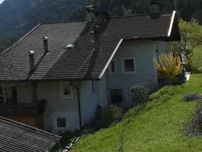 a house on the side of a hill at Obergereuth Hof 2021 in San Martino
