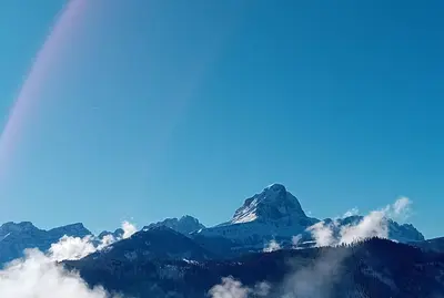 a mountain in the sky with clouds at Lü de Terza in San Vigilio Di Marebbe