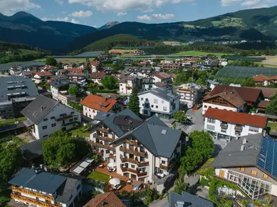 an aerial view of a town with houses at Am Brunnen Apartments in Naz-Sciaves