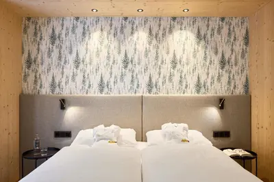 a resort in the mountains with snow on the ground at Movi Family Apart-Hotel ****s in Corvara in Badia