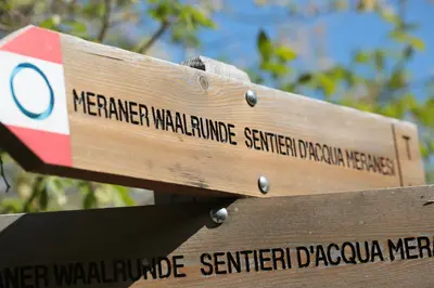 a wooden sign with the words merven walkerateerate seminarapartments at Appartements Residence Ganthaler in Rablà
