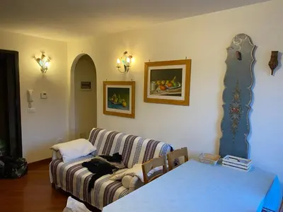 a living room with a couch and a table at CASA DI PITTO in Bressanone