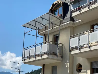 a building with balconies on the side of it at CASA DI PITTO in Bressanone