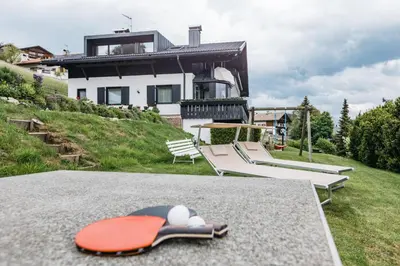 a skateboard laying on the ground in front of a house at Lisis Loggia in Nova Ponente