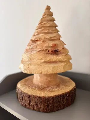 a wooden christmas tree made out of a tree stump at Casa Vacanze Natura in Mendola