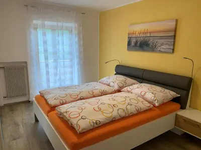 a bed with two pillows on it in a room at Appartment Valentin in Chiusa