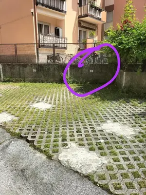 a purple string is sitting on a street at Franz home Wi-Fi AC 1 free parking in Bolzano