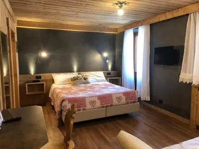 a bathroom with a shower with a sink at Baita Fraina in Cortina dʼAmpezzo